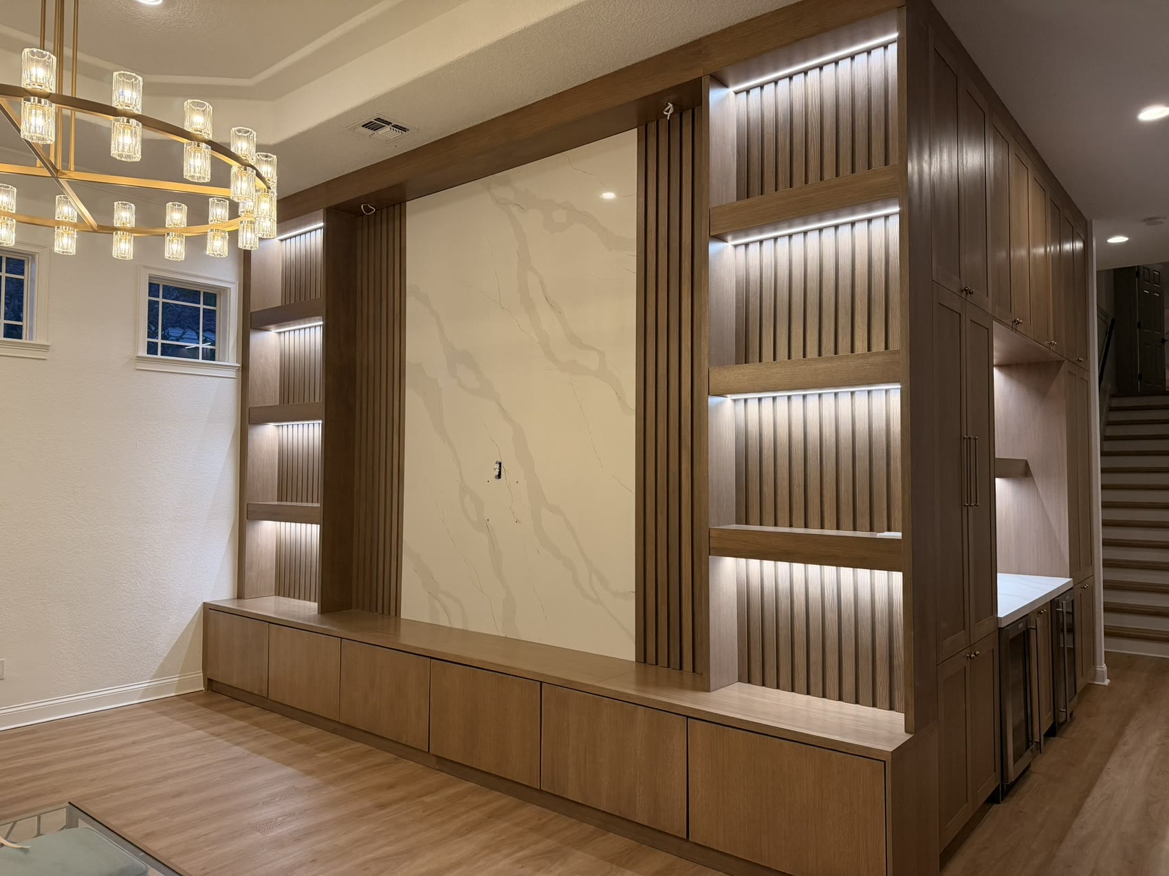 Custom media wall with integrated cabinetry